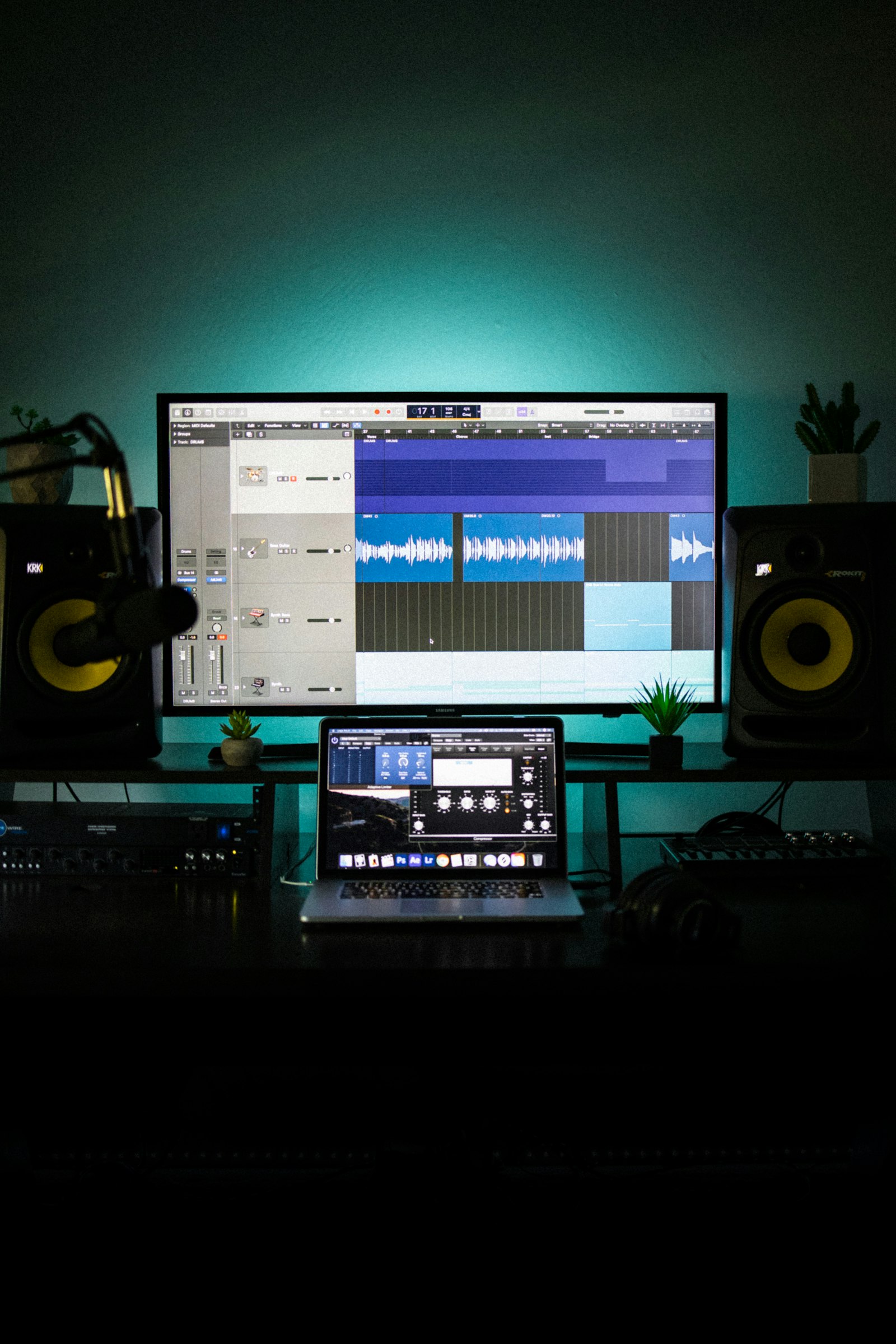 A home music studio glowing teal
